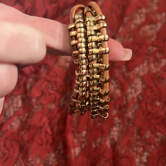 Two bracelets. One is stretch, Blue and silver and one has a clasp, tan and gold - Picture 3 of 7